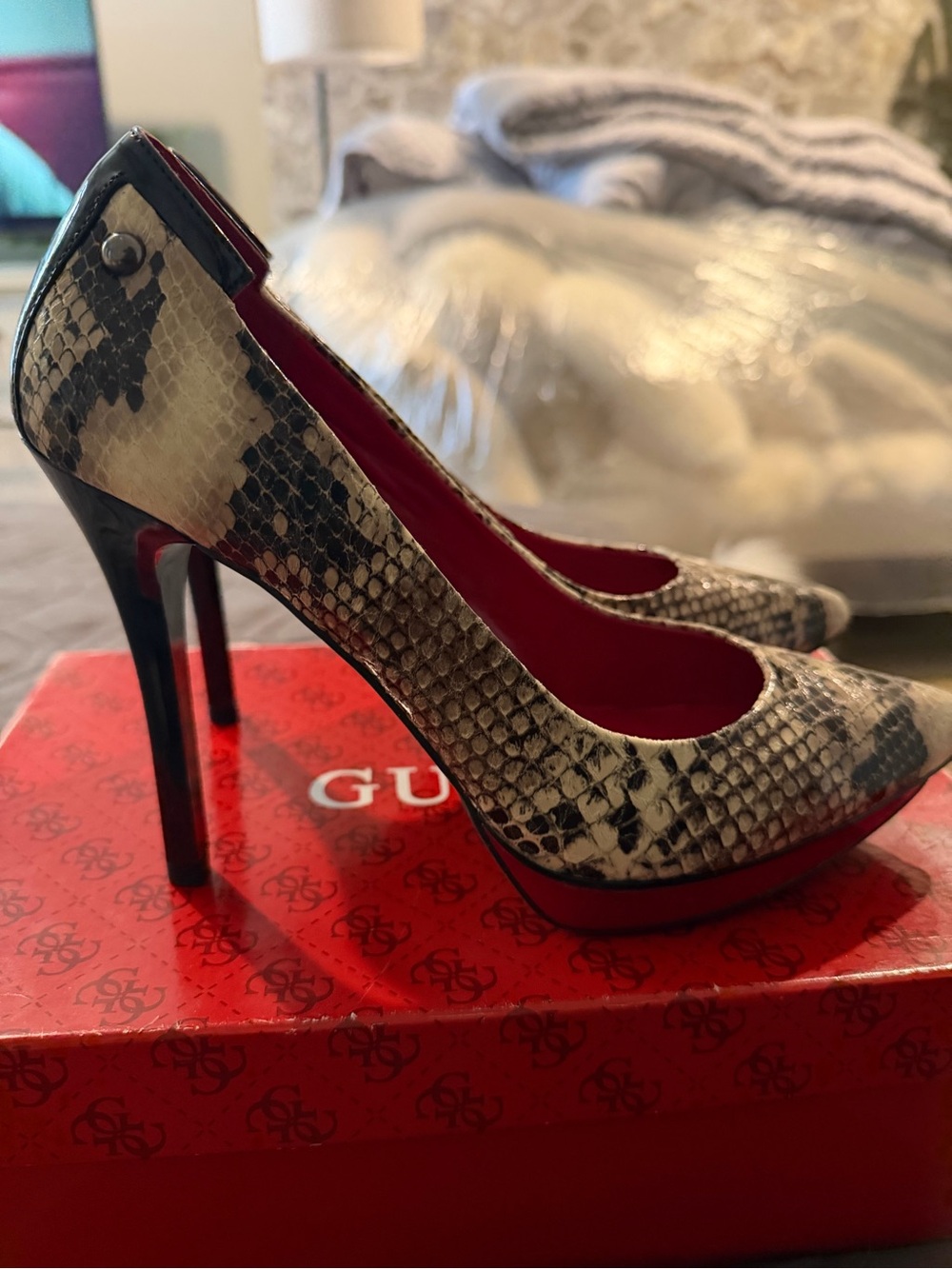 GUESS Snake-Print Pointed Toe Pumps with Red Trim